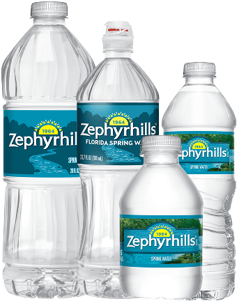 Four Zephyrhills spring water bottles of varying sizes