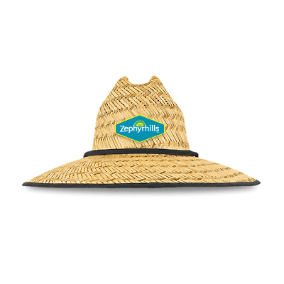 Straw hat with a wide brim and a patch labeled "Zephyrhills" on the front, featuring black trim.
